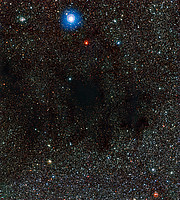 Delar av den mörka nebulosan Kolsäcken