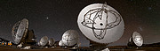 This image shows close to a dozen of the ALMA telescope dishes, all pointing in different directions. The dishes are large, almost bowl-like and and silvery in colou. The image is captured during the night, with a dark sky in the background, and the moon illuminating the dishes.