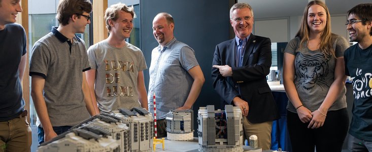 The LEGO® model of the Paranal platform is handed over to ESO’s Director General