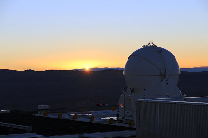Auxiliary Telescope against a setting Sun