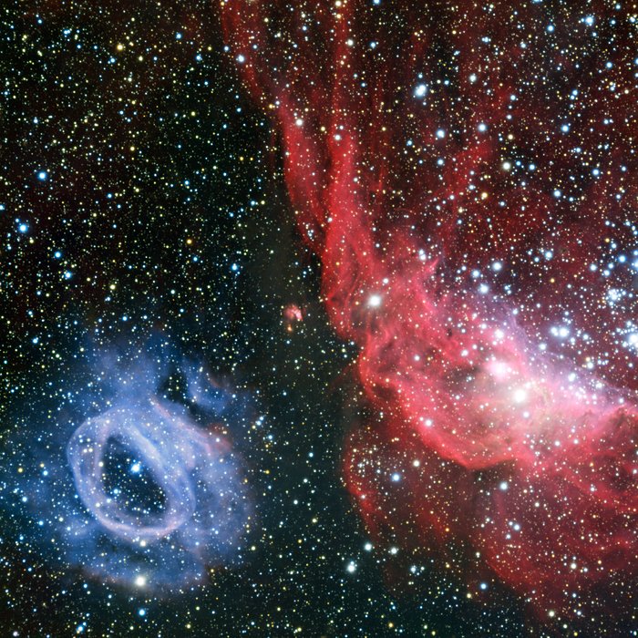 Två mycket olika lysande gasmoln i Stora magellanska molnet