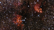 Zooma in på Kattassnebulosan och Hummernebulosan