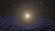 Artist’s impression of massive object distorting spacetime