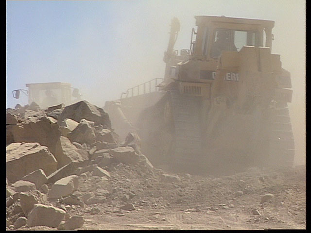 Removing debris from VLT construction, 1991 — clip 4